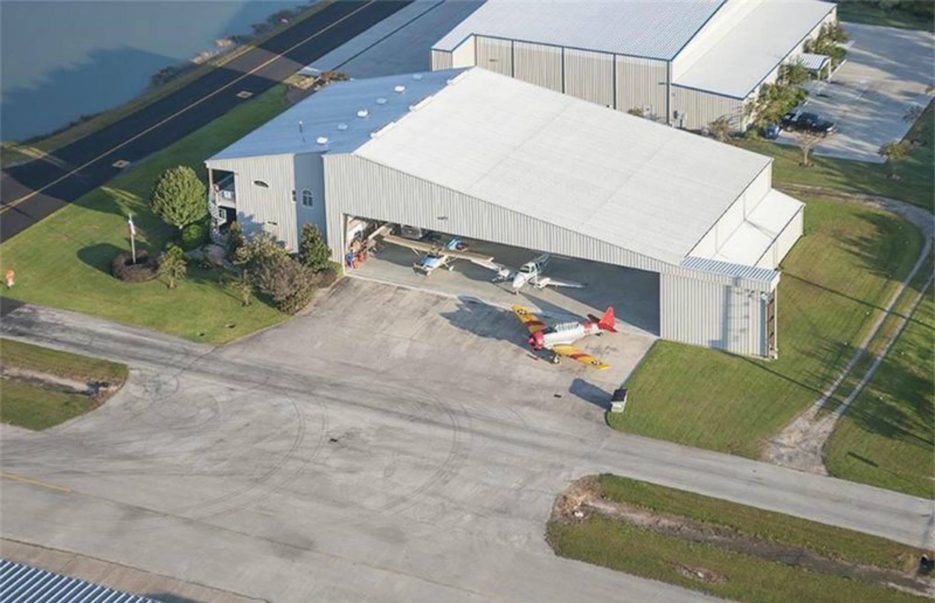 Contemporary hangar conversion: You won't believe people live inside these hangar homes